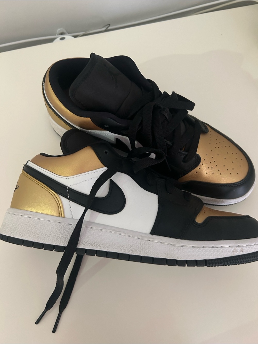 Air Jordan Kids Black and Gold Sneakers